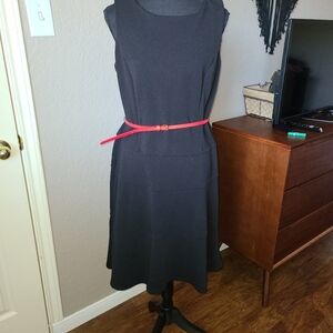Shelby and Palmer black dress with red belt